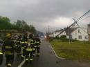 In Sturbridge, Massachusetts, state police officers survey the damage done by the tornado. [PJ Howe, N1PJ, Photo]