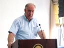 Bill Cross, W3TN -- an analyst in the FCC's Wireless Telecommunications Bureau -- addresses the conference. [Perry Green, WY1O, Photo]