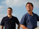 Carl Young (left) met Tim Samaras, WJ0G (right), while attending a meteorological conference. Samaras encouraged Young to collect meteorological data from inside tornadoes as the principal focus of his thesis research. Since spring 2003, Samaras and Young have tracked down more than 125 tornadoes. [Photo courtesy of The Discovery Channel] 