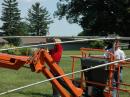 Lebanon Valley Society for Radio Amateurs members begin disassembling their 20 meter Yagi antenna. [Steve Ford, WB8IMY, Photo]