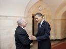 President Barack Obama greets his new White House Cyber Security Chief Howard A. Schmidt in the Cross Hall of the White House. December 17, 2009. [Lawrence Jackson, official White House photo]