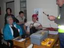 Instructor Ken Wilson, K6WLS, is conducting the break out session on Powerpoles, batteries and power supplies. From left to right: Pam Planck, KC6BCS; Gail Wright, Austin Ervin and Larry Wright, KI6PEF.