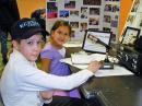 Paul Klippel, KC2SAS, and Maycee Campano make contact with another young person in Mississippi during the January 2008 Kids Day. The New Providence (New Jersey) Amateur Radio Club takes Kids Day seriously, and has another operation planned for this weekend.