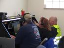 Tillamook County Amateur Radio operators Josh Neahring, KE7SKF, Su Yaremchuk, KF7ARR, and Alan Scovell, KE7SFS, manned the amateur station at the Regional 911 Call Center. [Gordon McCraw, WX7EM, Photo]